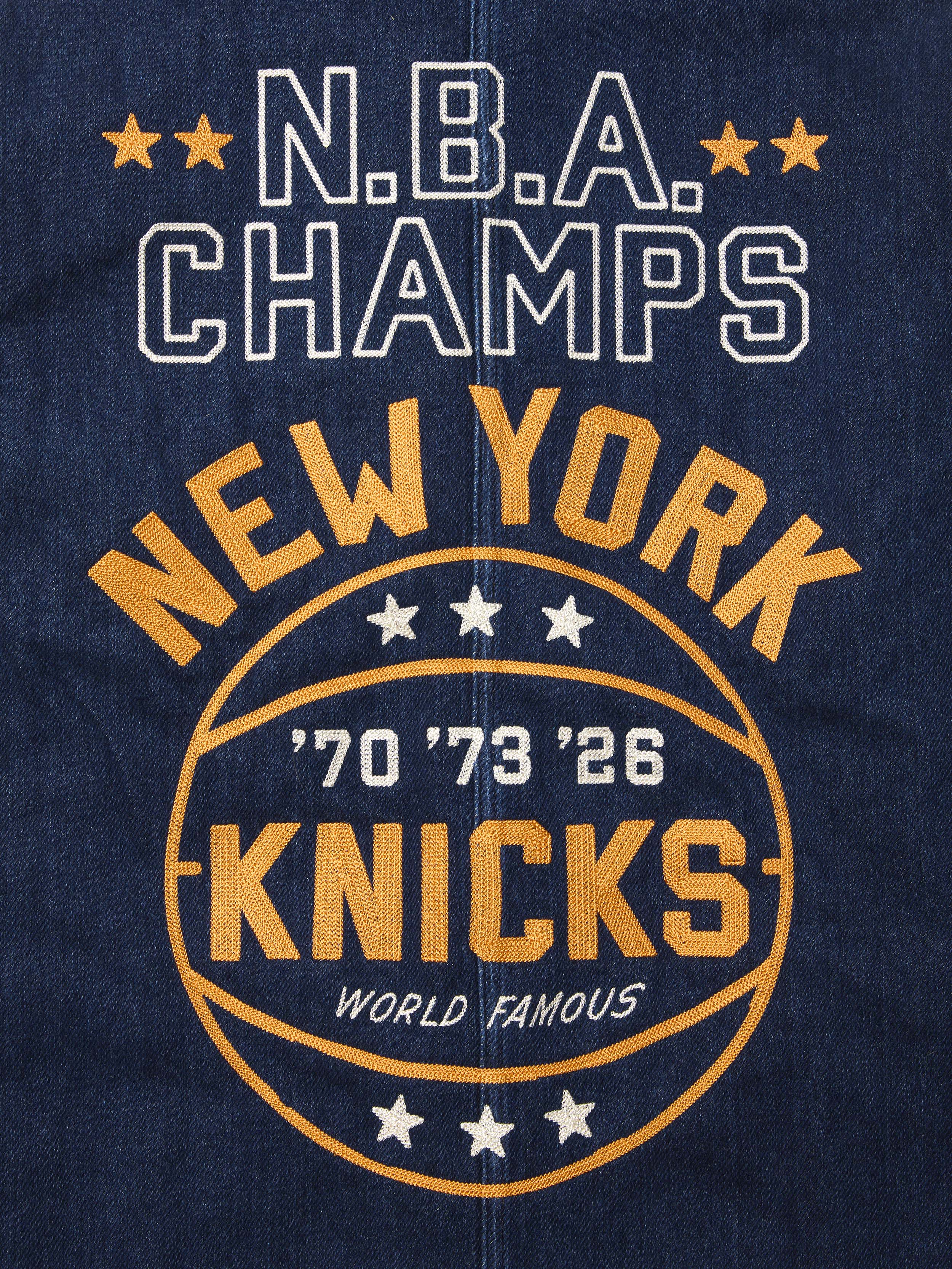 NBA Champs New York Knicks championship embroidered with years and stars on a dark blue denim jacket