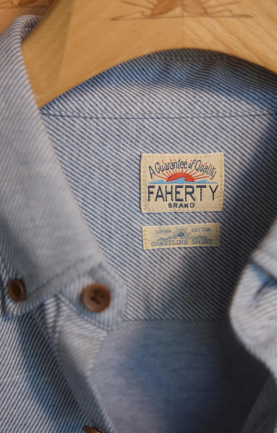 Detail of the coastline knit shirt labels on the inside of the shirt
