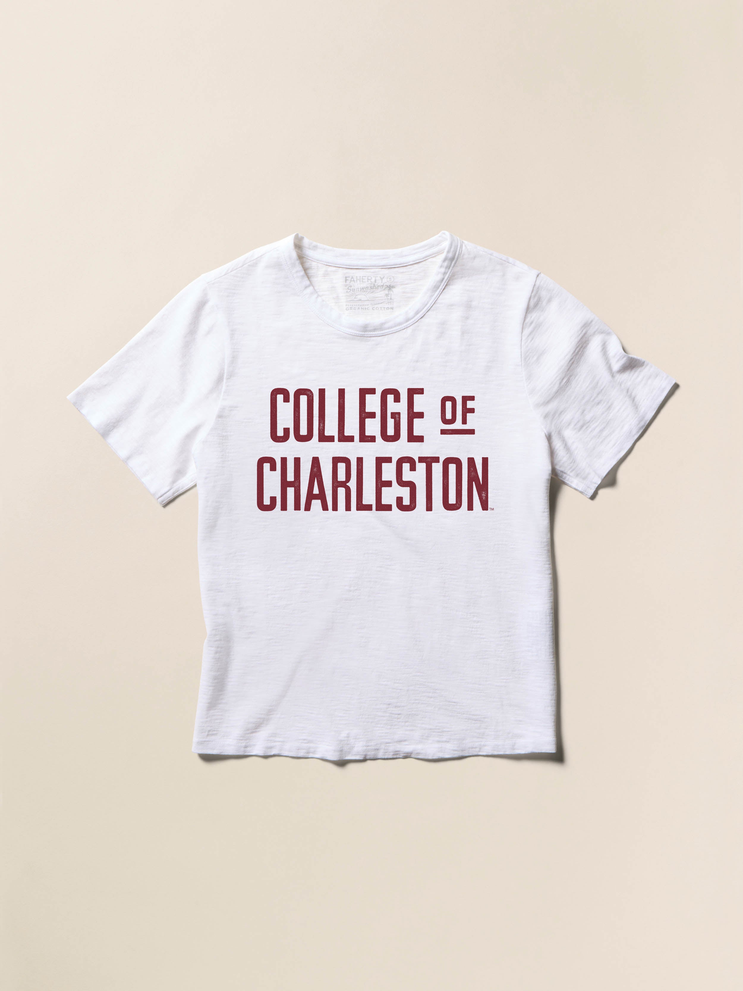 White short sleeve t-shirt with College of Charleston text on a beige background