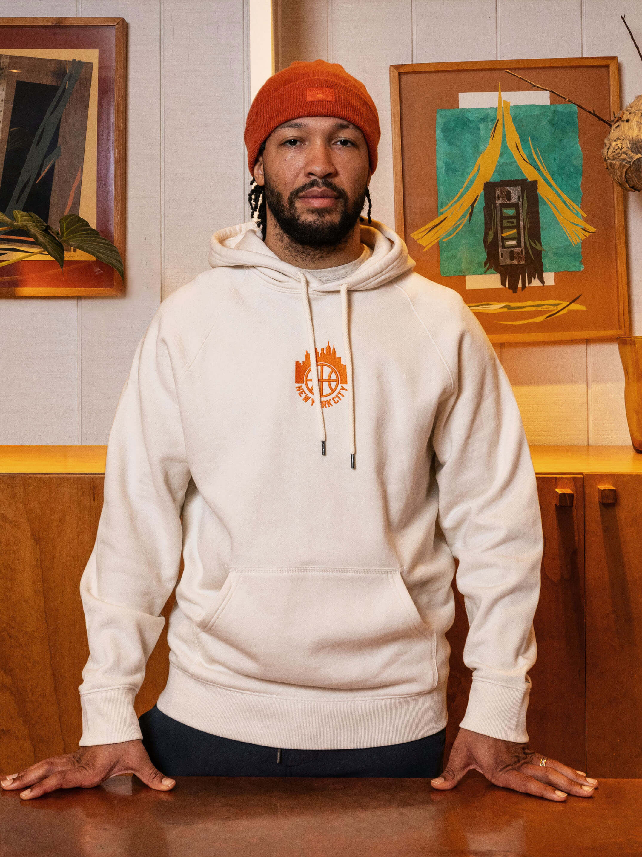 Jalen Brunson in a Faherty store wearing his signature hoodie