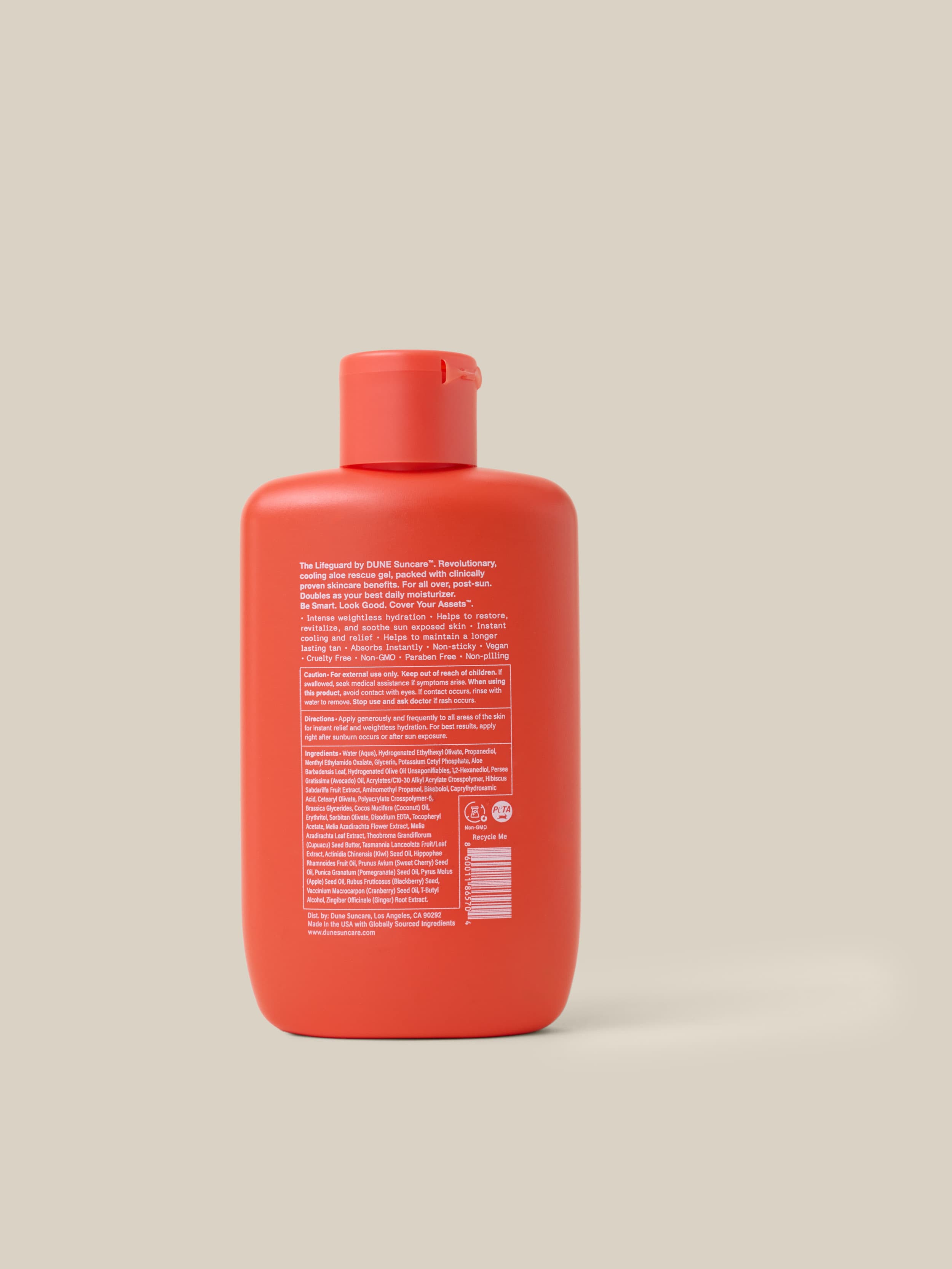 Red bottle with a beige background