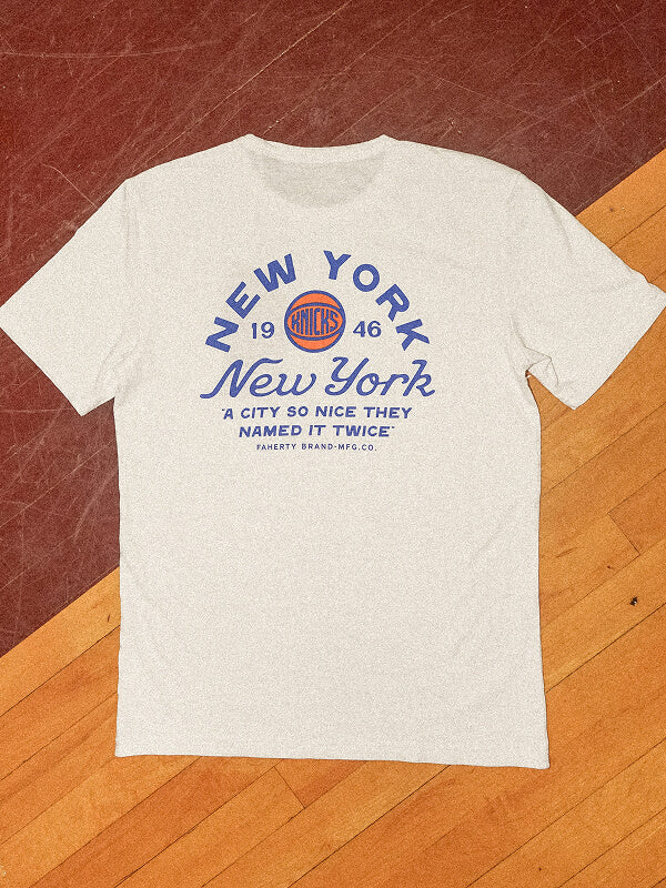 An overhead shot of a Faherty X Y Knicks shirt on a basketball court