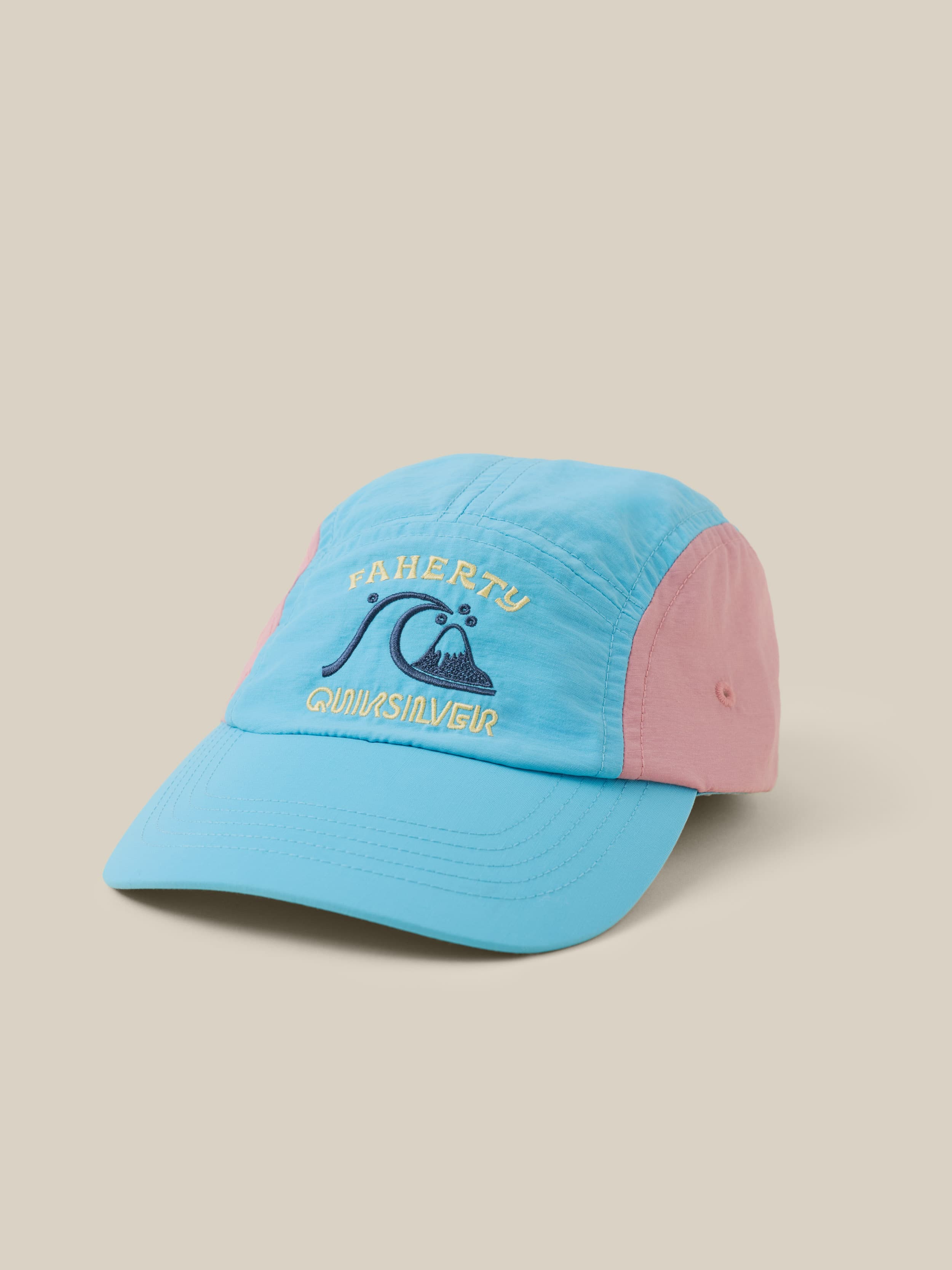 Pink and blue hat with Faherty x Quiksilver logo on the center front