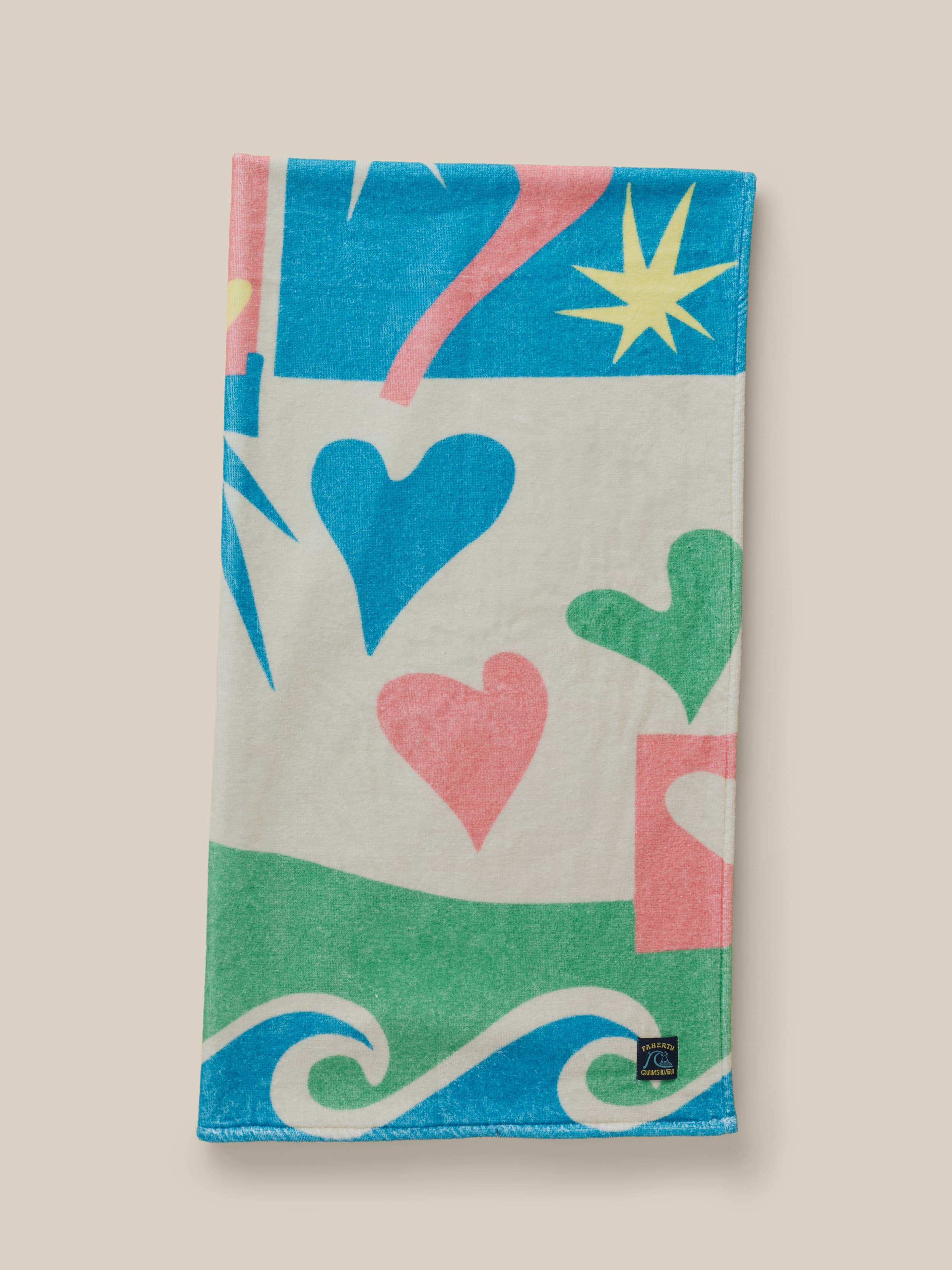 Multicolor printed towel on a beige background