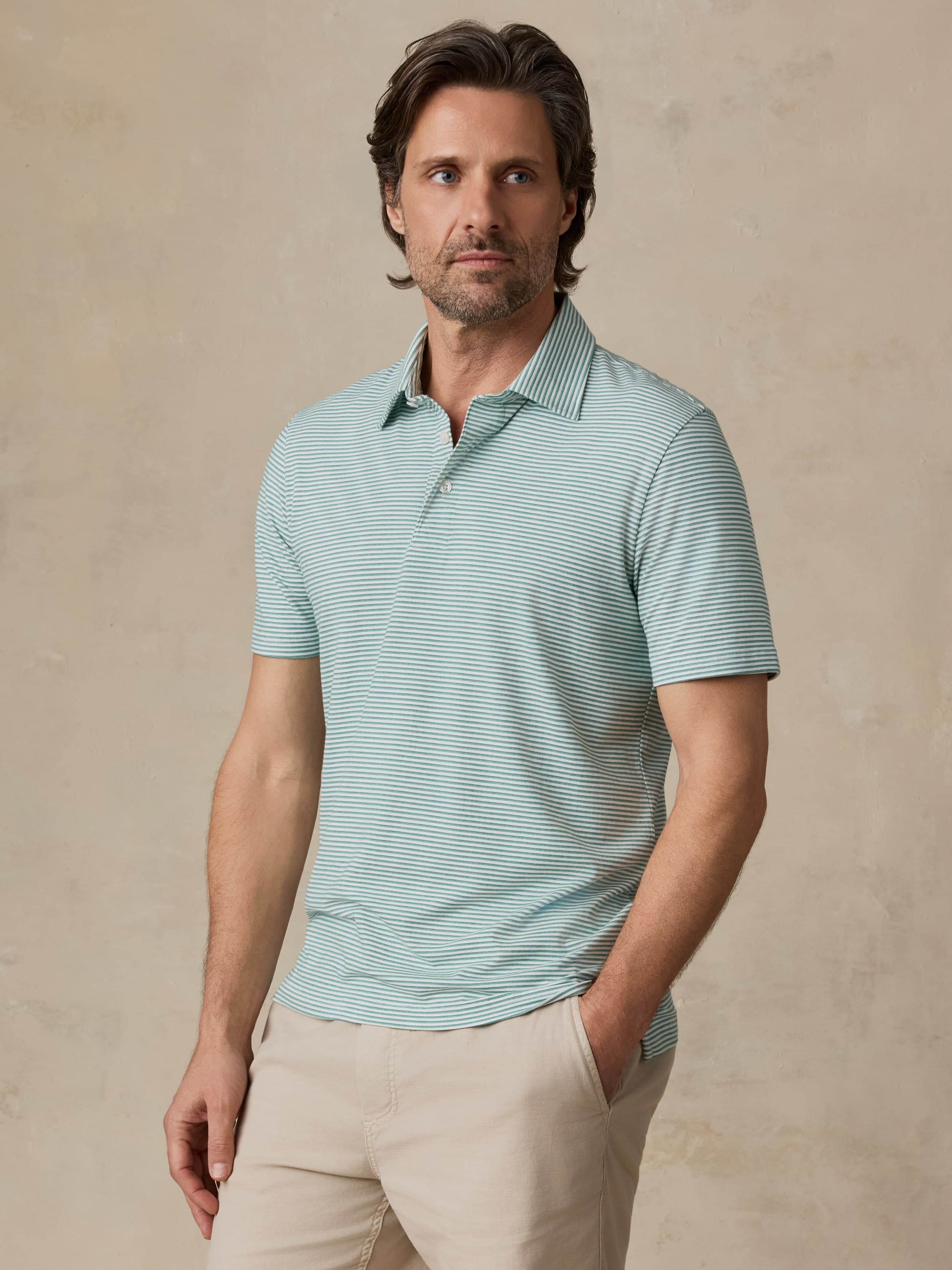 Short-Sleeve Movement™ Polo - Ivory Spring Stripe | Faherty Brand