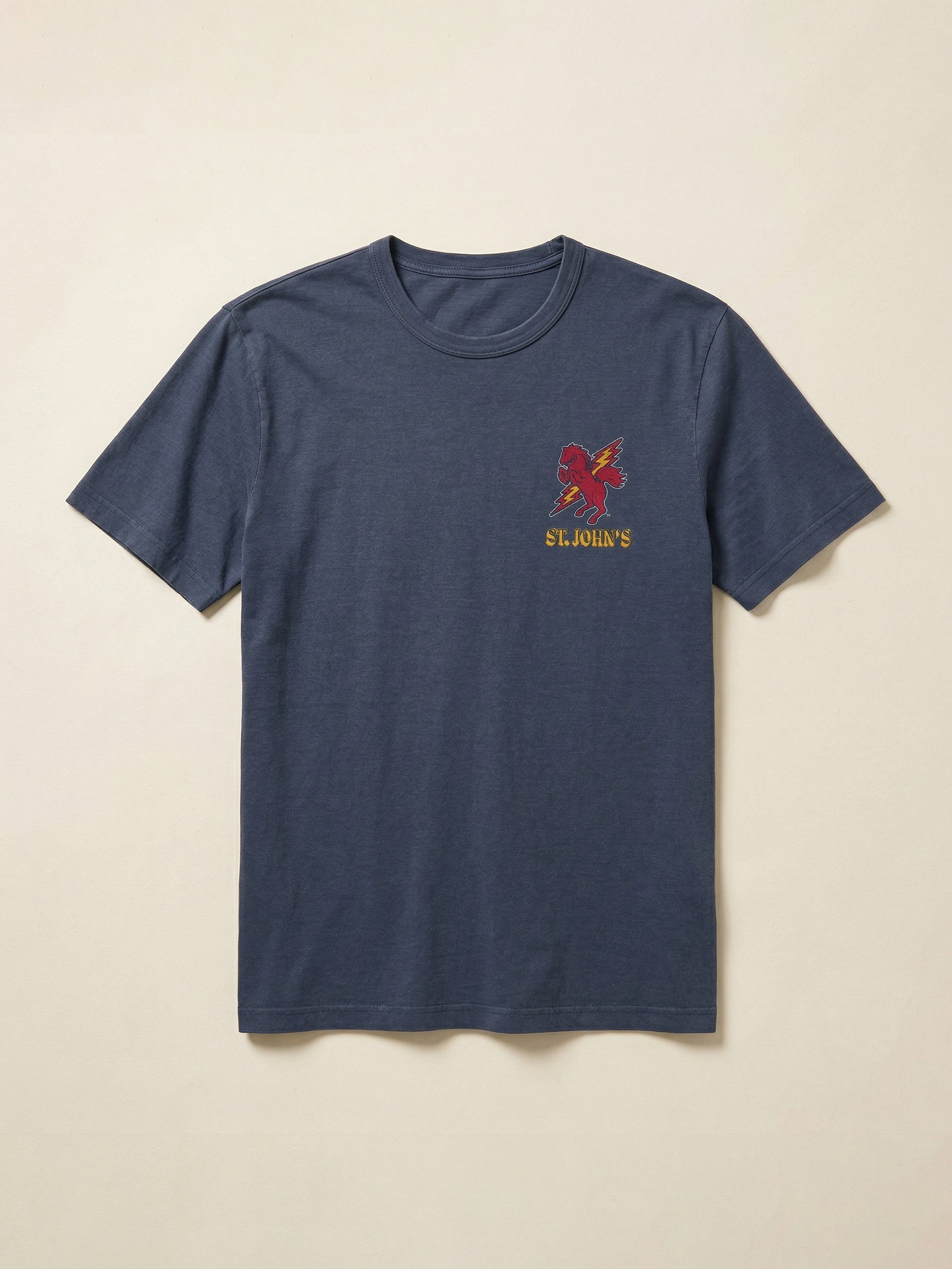 Navy blue t-shirt with a St. John's University logo on the left chest against a beige background