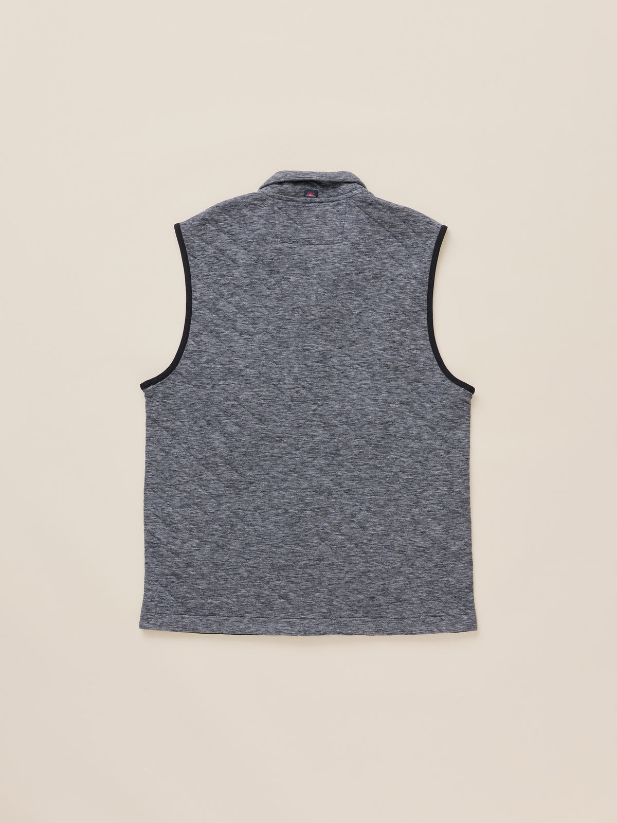 A sleeveless heather gray knit vest with black trim along the collar and armholes, shown from the back on a light beige background., image 7 of 7