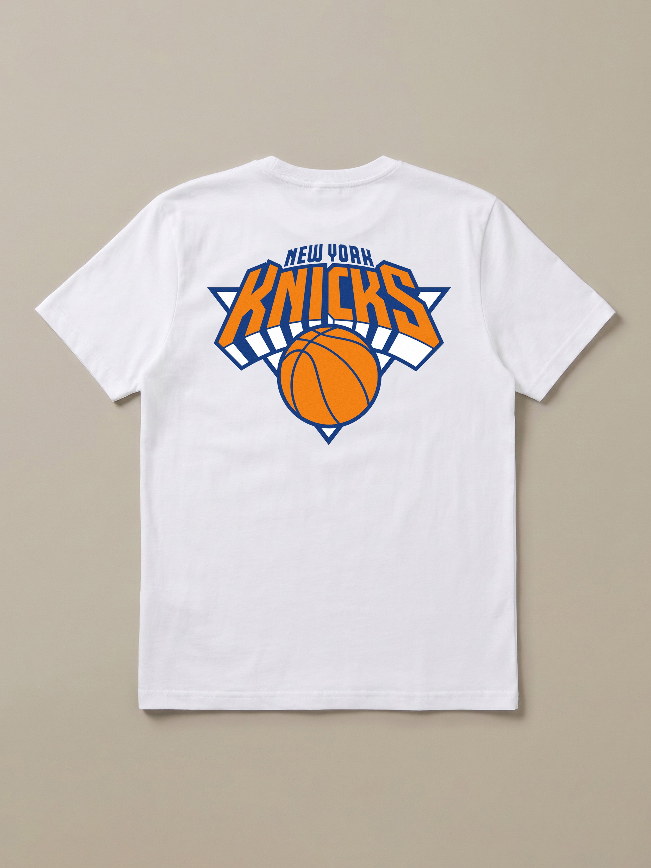 White t-shirt with New York Knicks graphic logo against a beige background