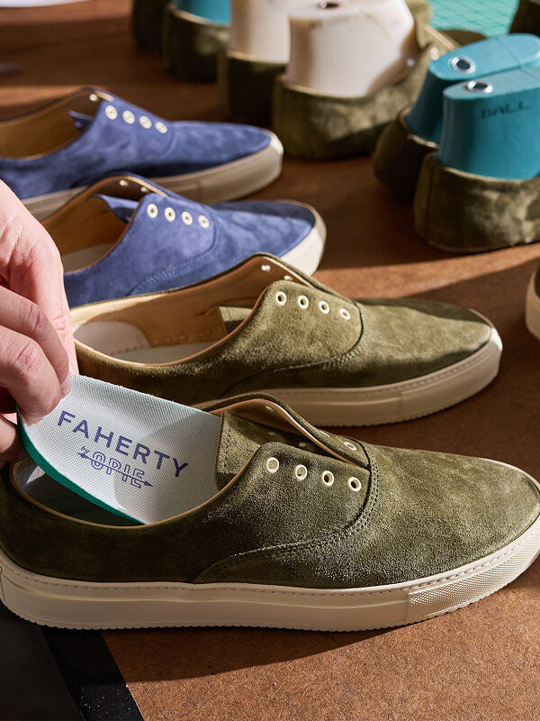 A detail shot of Faherty X Opie Way shoes being made in the factory