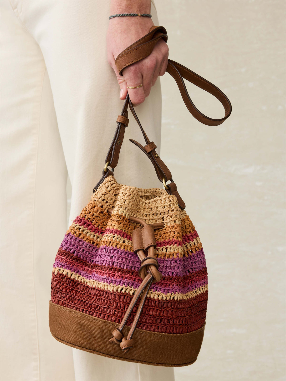 Striped Raffia Drawstring Bucket Bag - Sunrise Stripe, image 1 of 2