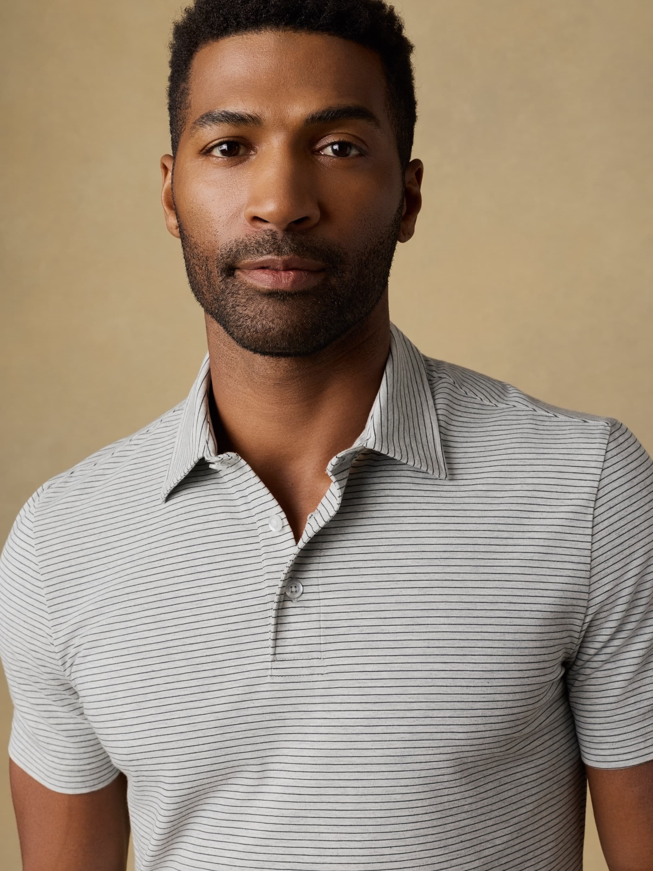 Short-Sleeve Movement™ Polo - Dark Cloud Stripe | Faherty Brand