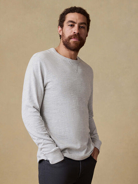 Male model wearing crew neck long sleeve tee shirt