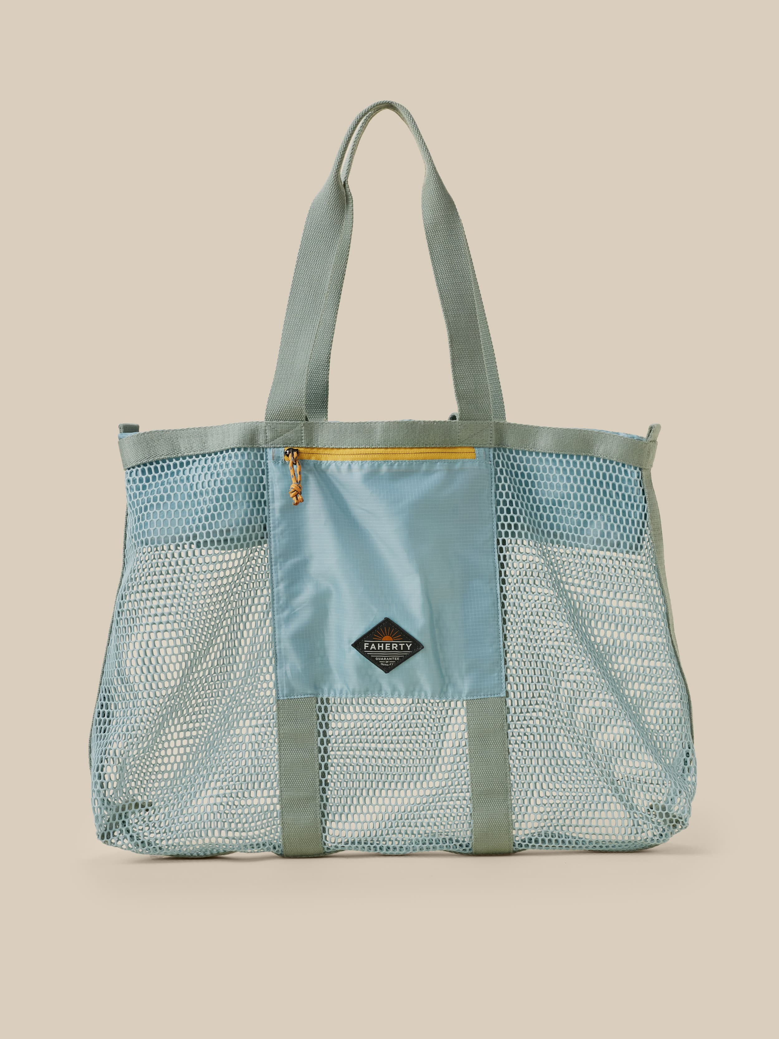 Mesh tote bag with a solid color section on a beige background