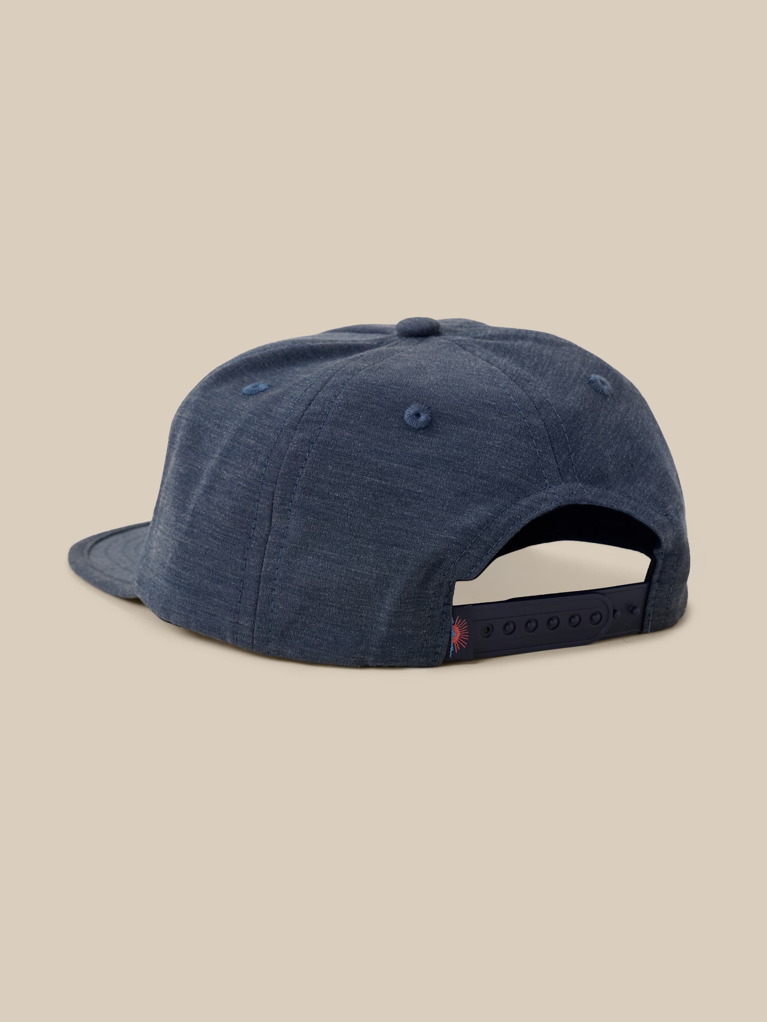 Blue cap on a beige background