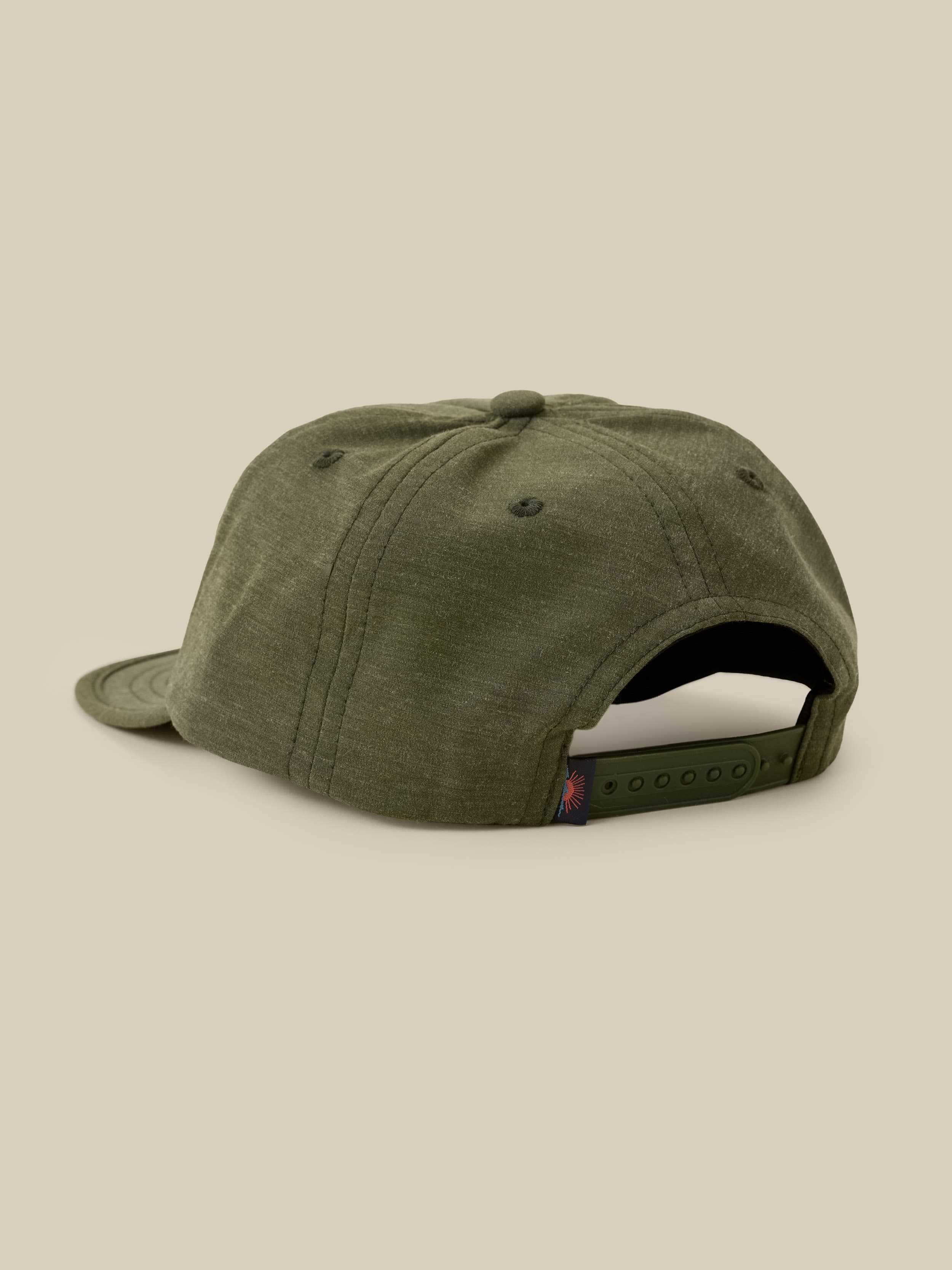 Green cap on a beige background