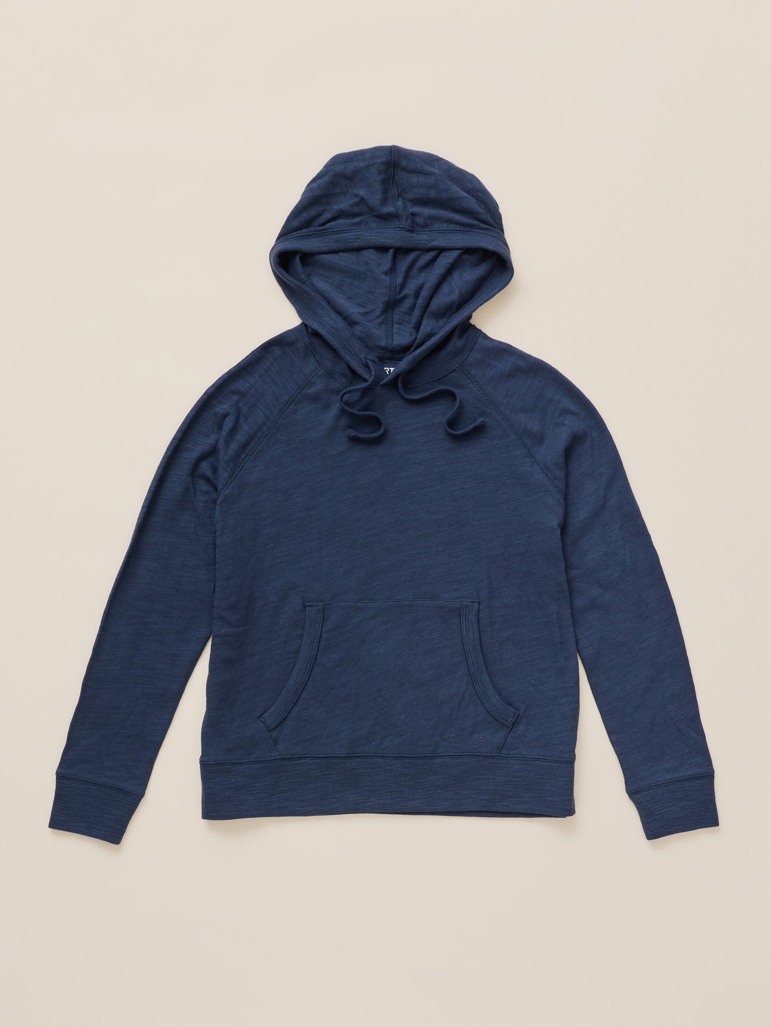 A navy blue long-sleeve hoodie with a drawstring hood and kangaroo pocket, laid flat against a light beige background.